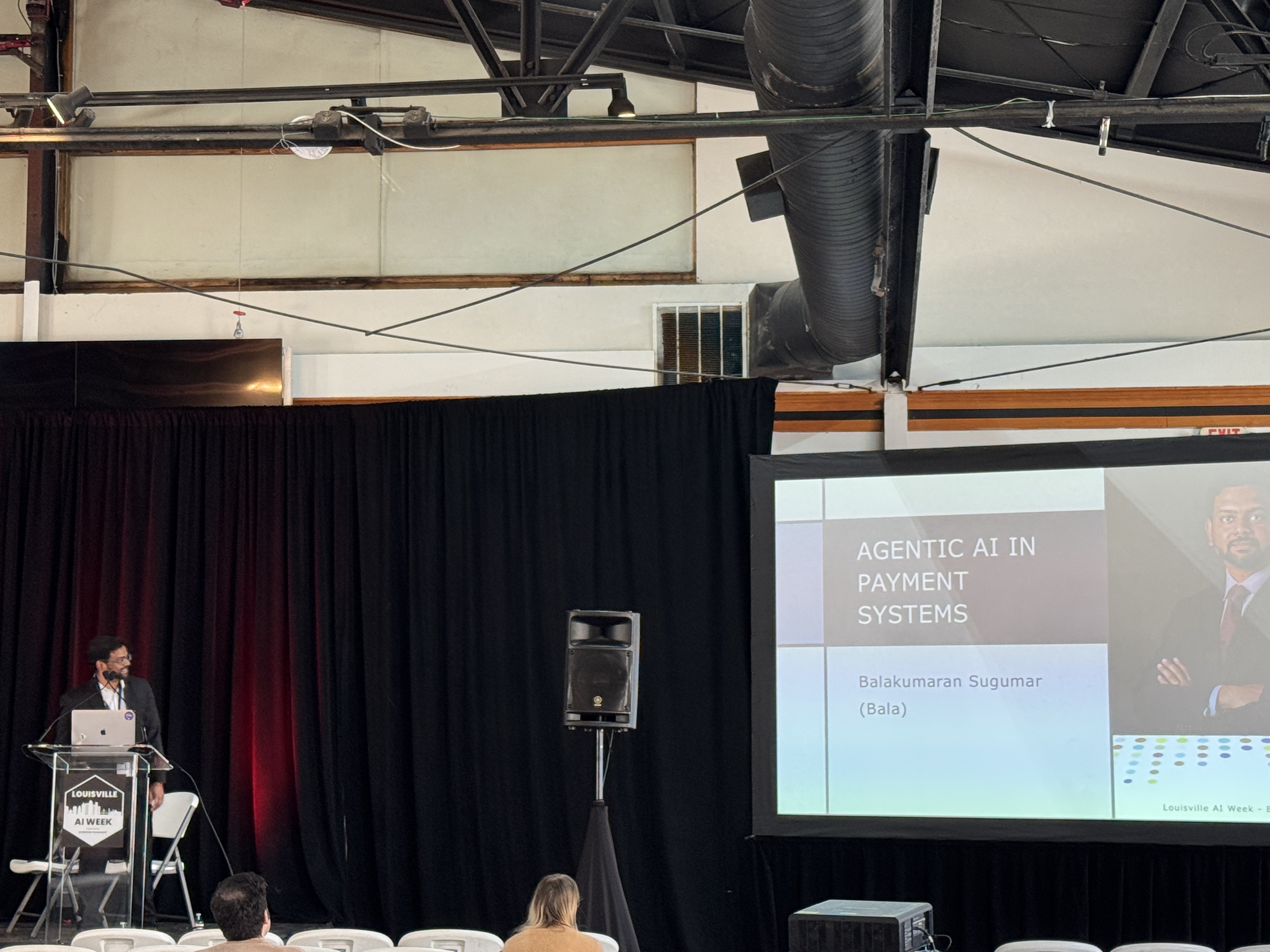 Balakumaran speaking at Louisville AI Week